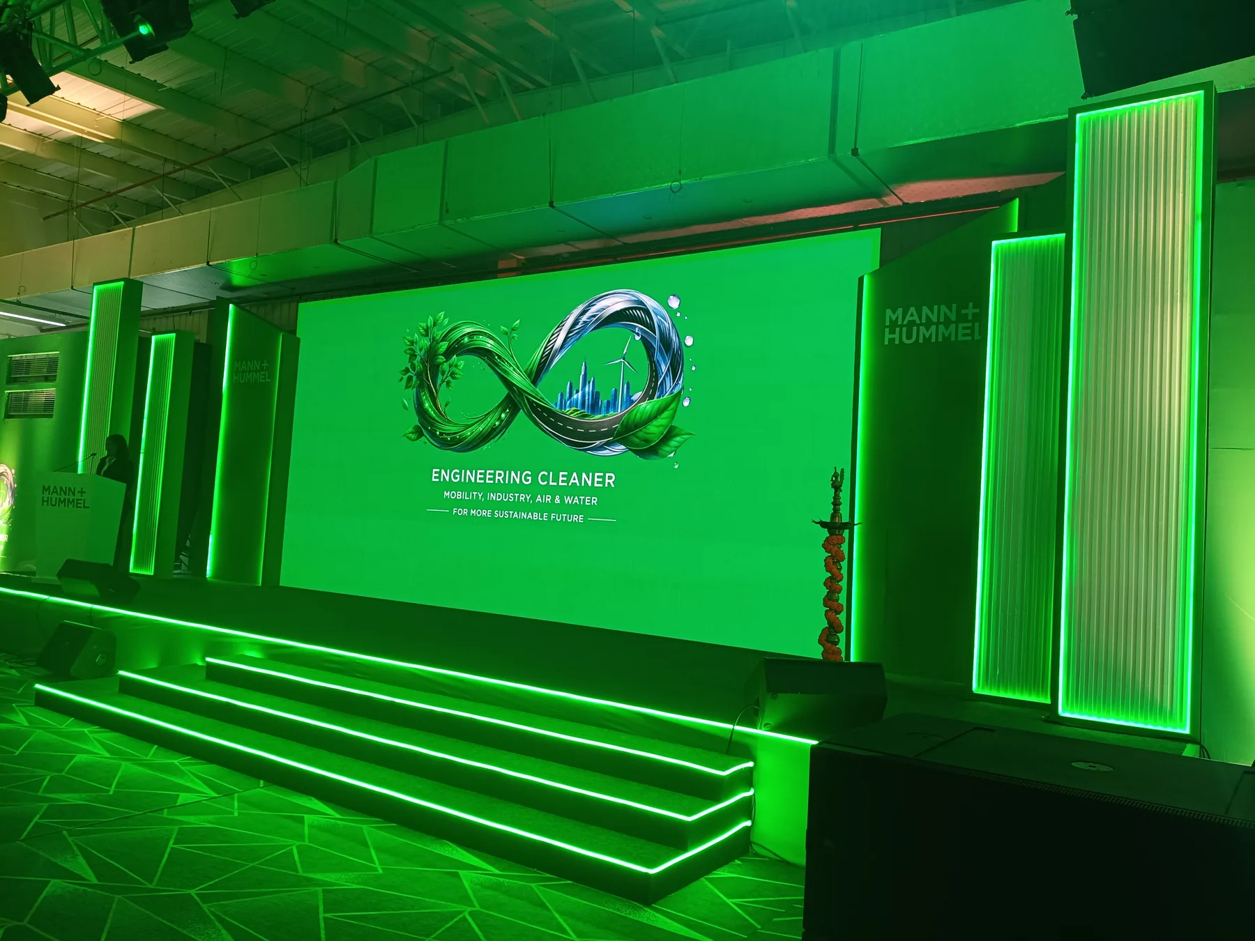 Stage with illuminated steps and green lighting